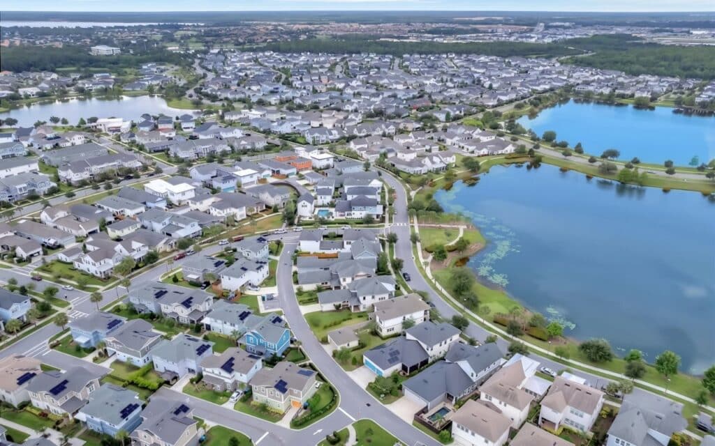 Lake Nona Golf Community Homes Lake Nona golf course community with luxury homes, lakes, and green open spaces.