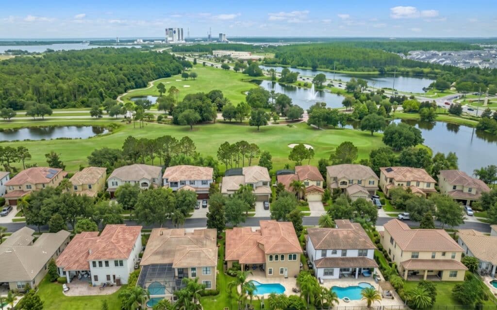 Lake Nona Golf Community Homes Lake Nona golf course community with luxury homes, lakes, and green open spaces.